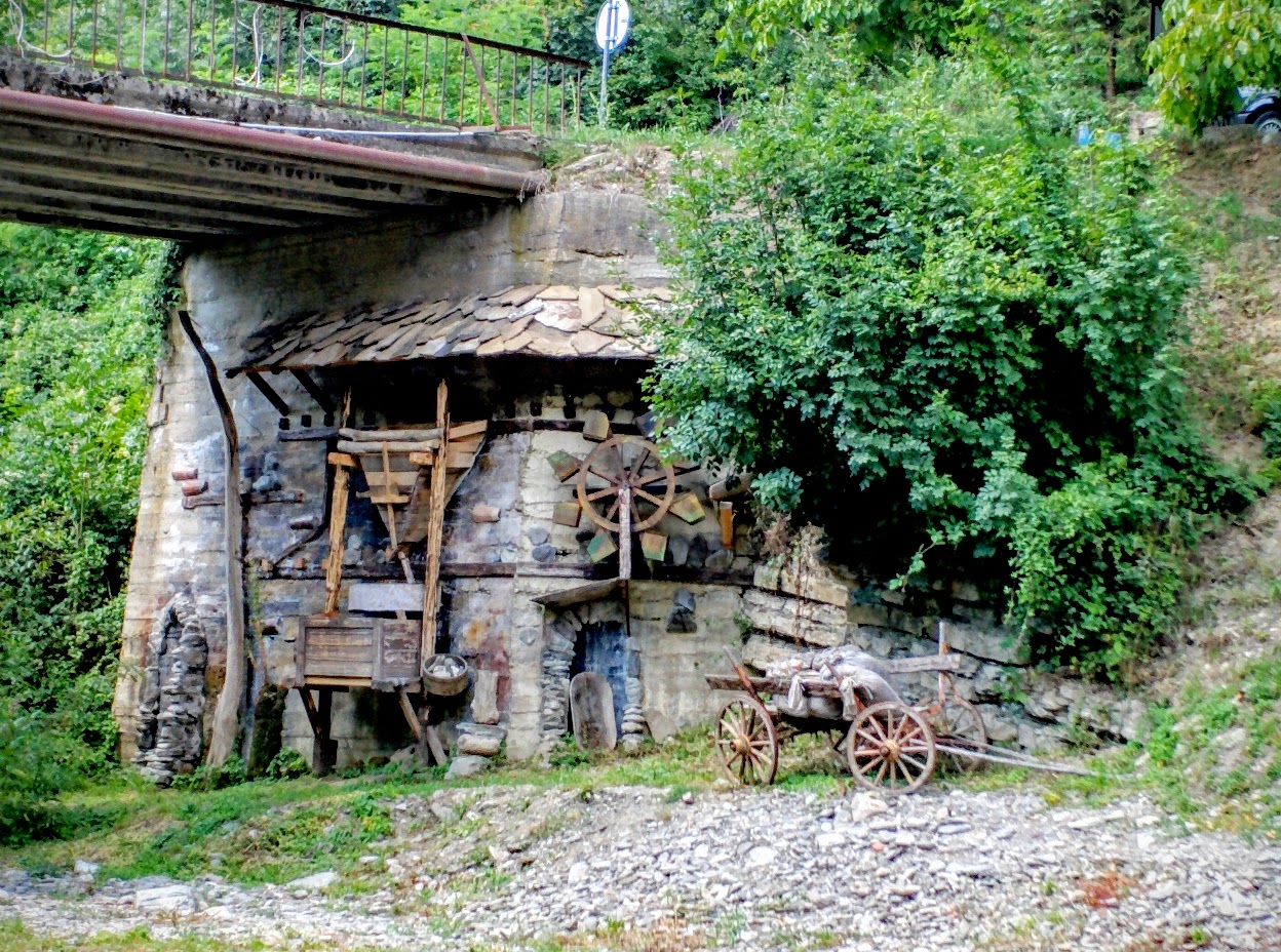 Water wheel and wooden AC unit pasted on the wall